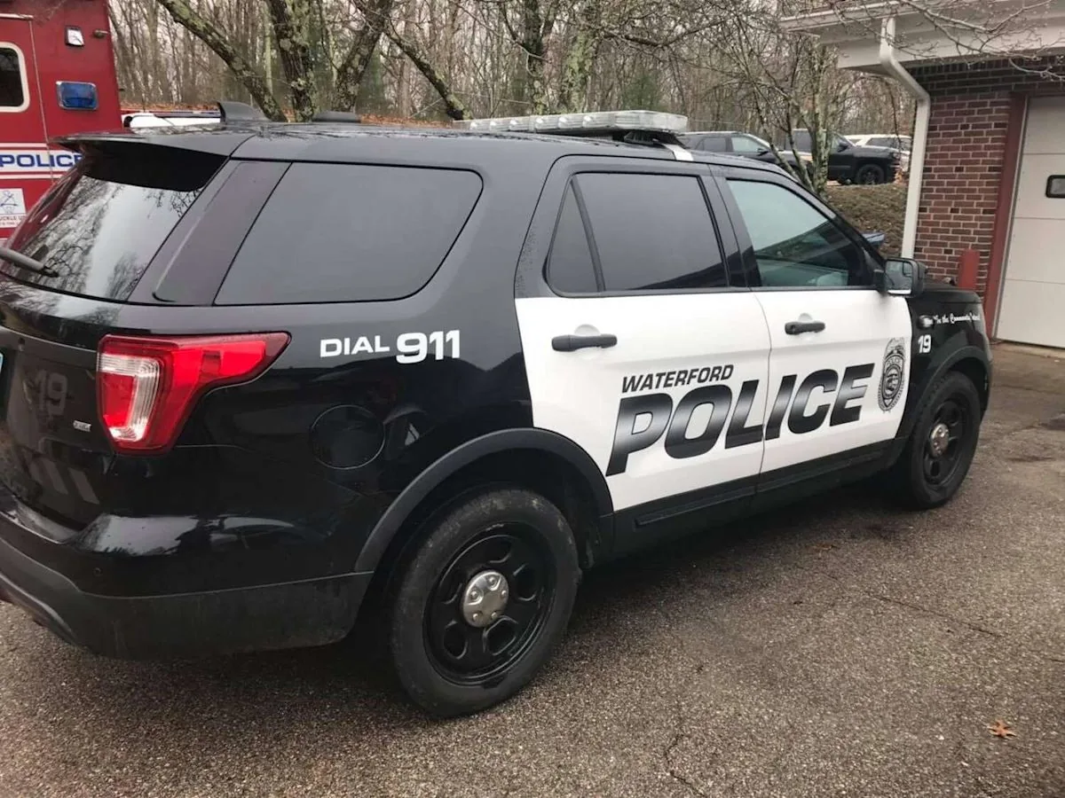 Police investigate an armed robbery reported at a gas station on Boston Post Road in Waterford